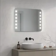 Miroir avec coins arrondis et points LED carrés. Parfait pour un éclairage de la salle de bains