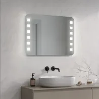 Miroir avec coins arrondis et points LED carrés. Parfait pour un éclairage de la salle de bains