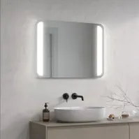 Miroir LED avec coins arrondis pour un éclairage optimal.